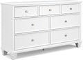 Signature Design by Ashley Fortman White 7-Drawer Wide Dresser for Bedroom | Painted wood chest, Tapered feet, Smooth ball-bearing glides, Durable hardwood solids and MDF substrate construction