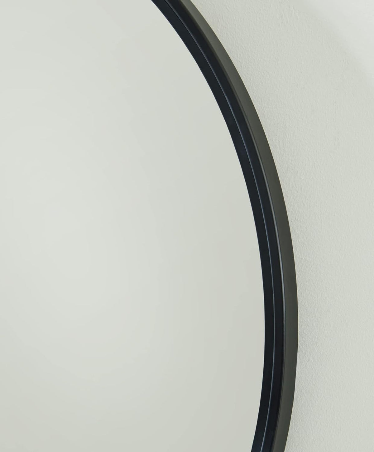 Signature Design by Ashley 31 Inch Round Black Wall Mounted Accent Mirror | Spacious 30 inch inner glass with thin metal frame, Modern decor for living rooms and dressing rooms, Brocky Series