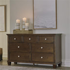 Signature Design by Ashley Traditional 7 Drawer Dresser, Dark Cherry | 62-inch wide dresser made of hardwood solids, birch veneer and MDF substrate, Dark cherry wood finish, Danabrin Series
