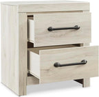 Signature Design by Ashley 2 Drawer White Nightstand with Charging Station | Engineered wood bedside table with dark elongated hardware, Faux linen drawer linings, 22"W x 16"D x 25"H, Cambeck Series