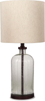 Signature Design by Ashley Bandile Seeded Glass Bedside Table Lamp, Bronze | Textured clear glass base, Light fabric drum shade, Modern farmhouse style, Living room reading spaces