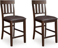 Signature Design by Ashley Haddigan Counter Height Bar Stool, Set of 2 | Easy-clean faux leather cushioned seat, Casual farmhouse wood slat back design, 25.6-inch seat height for kitchen islands