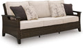Signature Design by Ashley Drakes Beach 3-Seat Outdoor Sofa, Brown Wicker | Sturdy aluminum frame, Woven-look dark brown resin wicker, Bleach cleanable Nuvella fabric, 4 throw pillows included