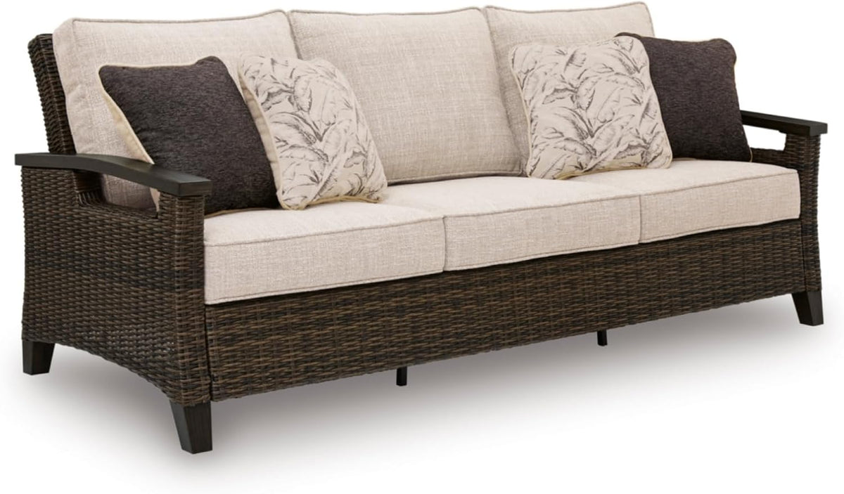 Signature Design by Ashley Drakes Beach 3-Seat Outdoor Sofa, Brown Wicker | Sturdy aluminum frame, Woven-look dark brown resin wicker, Bleach cleanable Nuvella fabric, 4 throw pillows included