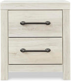 Signature Design by Ashley 2 Drawer White Nightstand with Charging Station | Engineered wood bedside table with dark elongated hardware, Faux linen drawer linings, 22"W x 16"D x 25"H, Cambeck Series