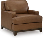 Signature Design by Ashley Oversized Brown Leather Accent Chair, Amber | Genuine and faux leather with brass-tone nailhead trim, Faux wood base, No assembly living room chairs, Brendola Series