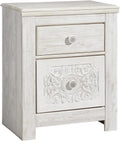 Signature Design by Ashley Nightstand, Paxberry Boho Whitewash | Engineered wood and decorative laminate, Ornate carved-effect medallion details, Includes 2 built-in USB charging ports