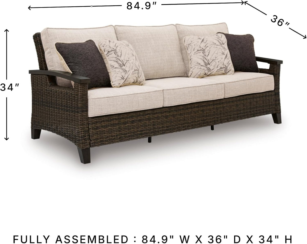 Signature Design by Ashley Drakes Beach 3-Seat Outdoor Sofa, Brown Wicker | Sturdy aluminum frame, Woven-look dark brown resin wicker, Bleach cleanable Nuvella fabric, 4 throw pillows included