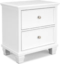 Signature Design by Ashley Fortman White Nightstand, 2 Drawer Storage, Hardwood Solids and MDF Construction, Traditional Wood Bedside Table, 25" W | Hardwood solids and MDF substrate, Smooth-gliding closed storage, Ideal for master and guest rooms