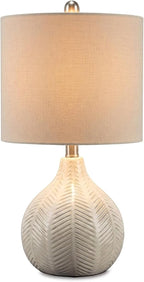 Signature Design by Ashley Rainermen Ceramic Table Lamp, 21", Off White | Textured herringbone base, Transparent white glaze, Hardback fabric drum shade, Bedside use, 92.5-inch cord, E26 socket