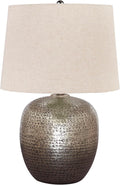 Signature Design by Ashley Magalie Metal Table Lamp, Antiqued Silver | Textured hammered aluminum base, Vintage warmth, Crisp modified drum shade, Cozy living room lighting
