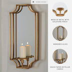 Signature Design by Ashley Pagoda Mirrored Metal Candle Wall Sconce, Gold | Polished 20-inch gold metal frame, Holds pillar or taper candles, Mirrored backplate to double ambient glow, Dumi Series