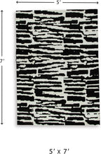 Signature Design by Ashley Bramshaw Area Rug, 5x7, Black and White | Soft 9 mm pile for underfoot comfort, High-contrast abstract pattern, Durable machine-woven polyester