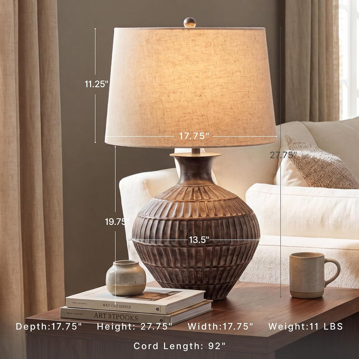 Signature Design by Ashley Magan Metal Table Lamp, 28", Antique Bronze | Antique bronze-tone metal base, Textured pattern, Fabric modified drum shade, Living room or entryway use, 3-way switch