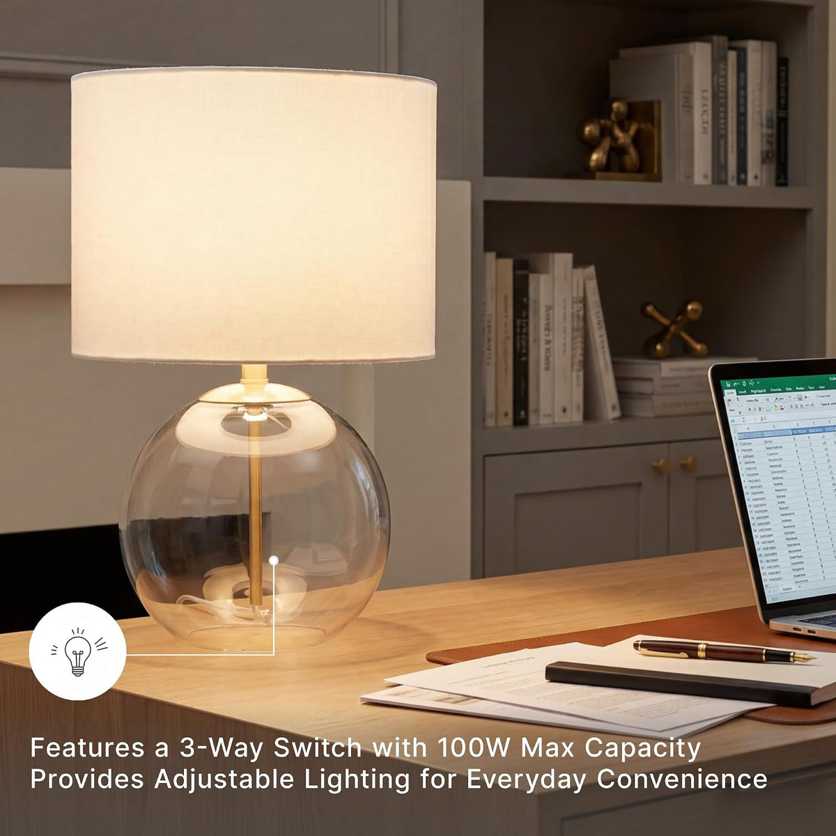 Signature Design by Ashley Glass Table Lamp, Modern Bedside, Clear & Brass | White fabric drum shade, Compact round clear glass profile for modern nightstands, Samder Series