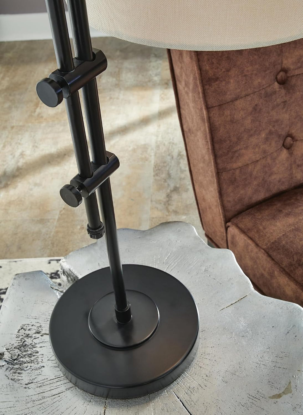 Signature Design by Ashley Baronvale Accent Table Lamp, Adjustable Black | Metal frame, White hardback fabric drum shade, Casual style, Living room or office use, Toggle switch