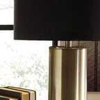 Signature Design by Ashley Jacek Contemporary Table Lamp Set of 2 | Textured faux concrete and brass-finished metal, Black drum shade with goldtone foil interior, Living room and bedside use