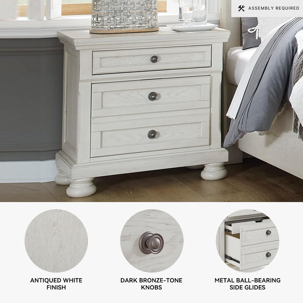 Signature Design by Ashley Tall Antique White Nightstand Wood Bedside Table | Two dovetail drawers, Hidden pull-out tray for valuables, Textured antiqued white oak finish, Robbinsdale Series