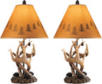 Signature Design by Ashley Derek Rustic Table Lamps, Living Room, Set of 2 | Durable poly resin antler base, Warm translucent paper silhouette shade projecting forest scenes, Rustic cabin style