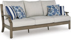 Signature Design by Ashley Rainier Ranch 3-Seat Outdoor Sofa, Beige | Rust-resistant wood-look aluminum frame, UV-resistant Nuvella+ cushions, 3-seat casual contemporary patio sofa