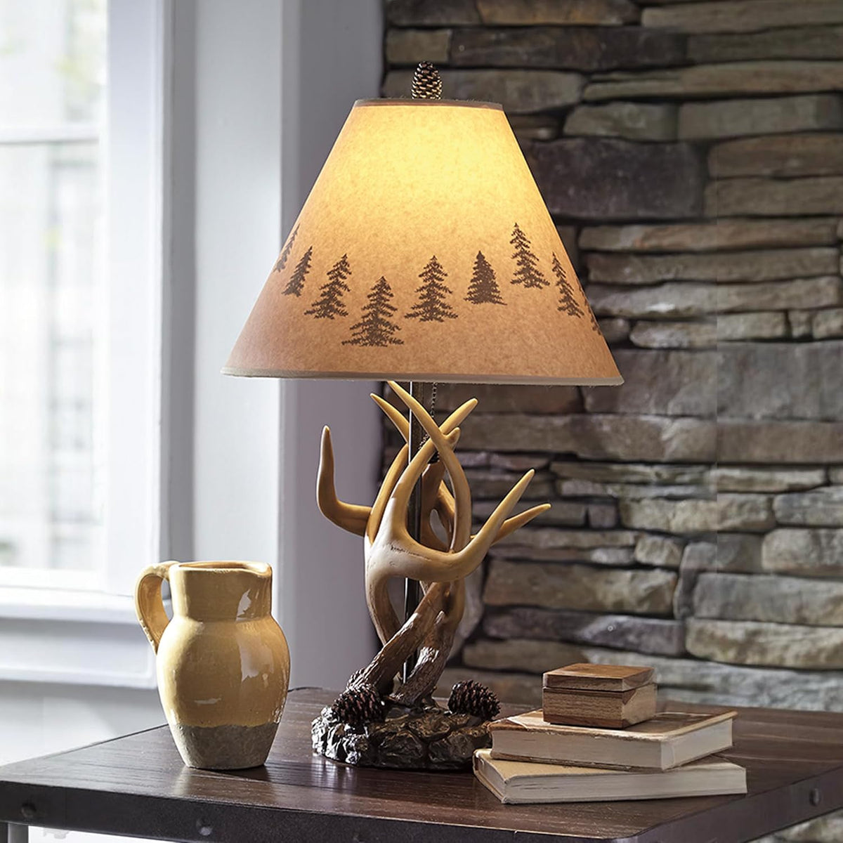 Signature Design by Ashley Derek Rustic Table Lamps, Living Room, Set of 2 | Durable poly resin antler base, Warm translucent paper silhouette shade projecting forest scenes, Rustic cabin style