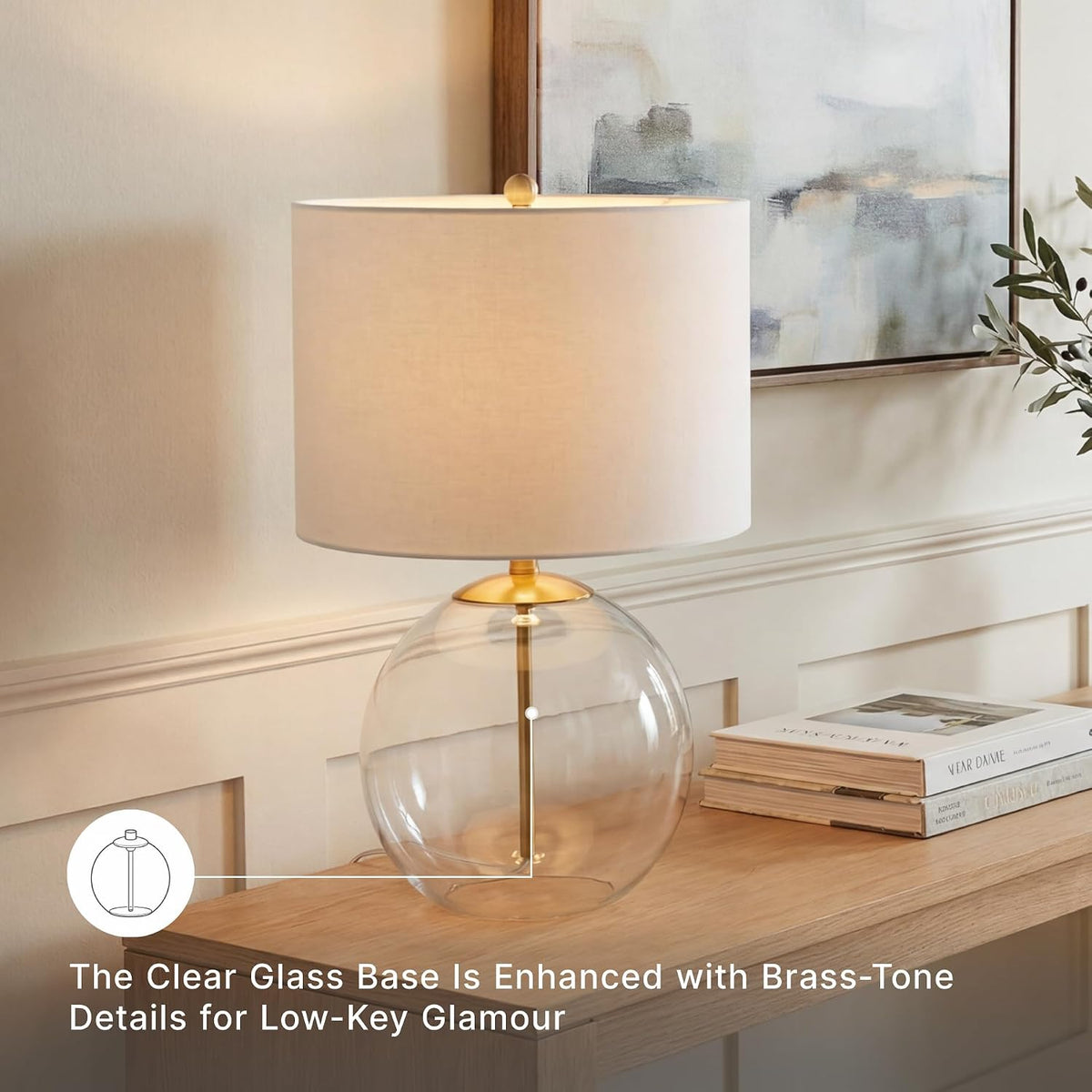 Signature Design by Ashley Glass Table Lamp, Modern Bedside, Clear & Brass | White fabric drum shade, Compact round clear glass profile for modern nightstands, Samder Series