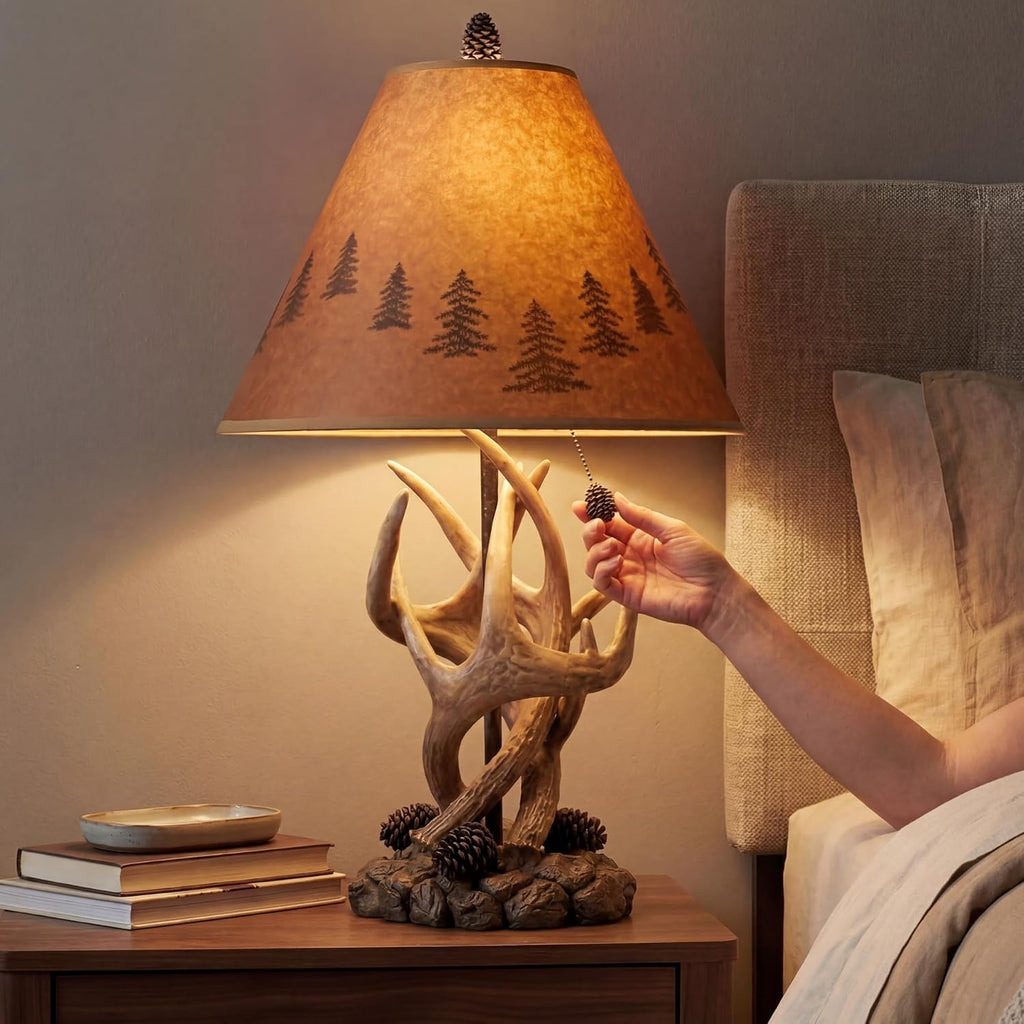 Signature Design by Ashley Derek Rustic Table Lamps, Living Room, Set of 2 | Durable poly resin antler base, Warm translucent paper silhouette shade projecting forest scenes, Rustic cabin style