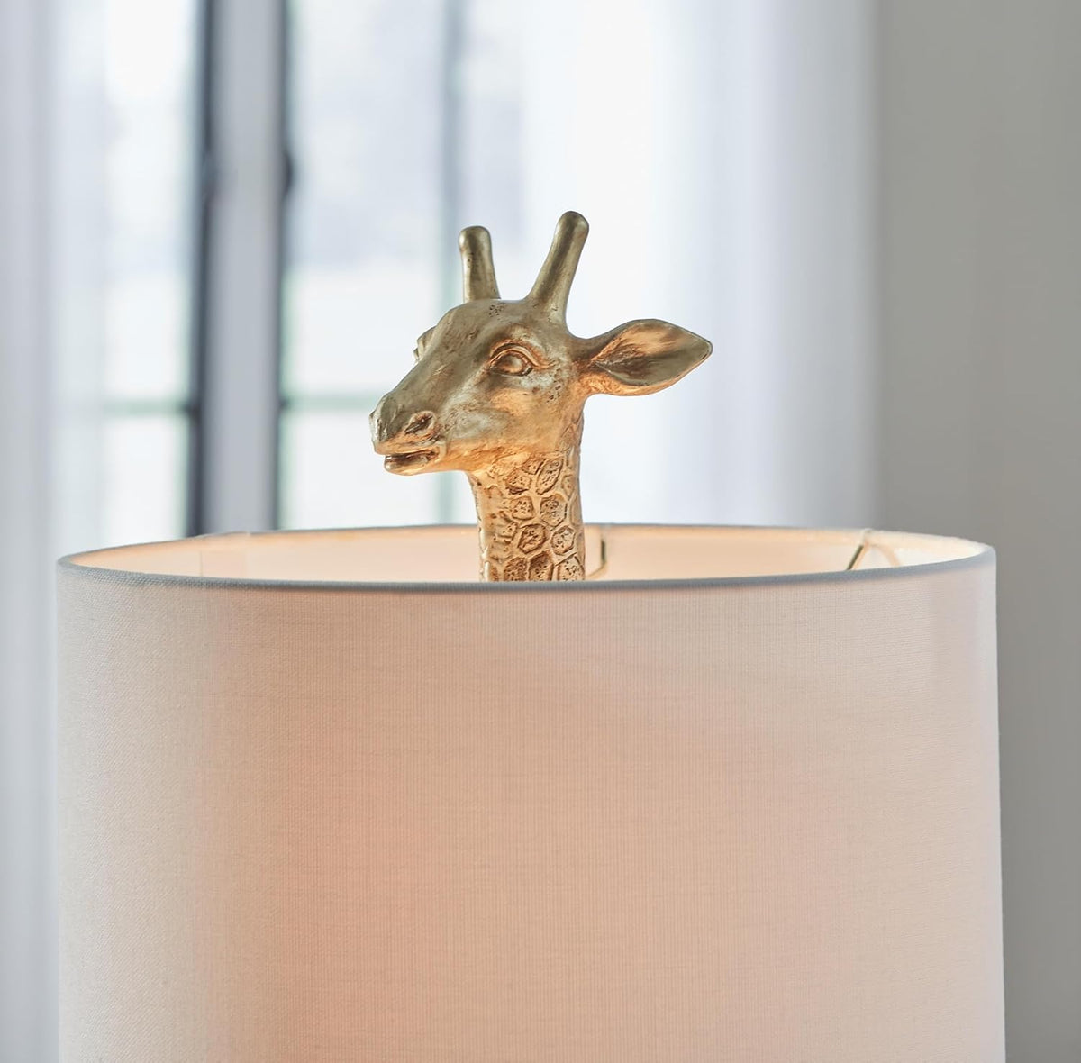 Signature Design by Ashley Giraffe Table Lamp, Goldtone Safari Animal Lamp | Sturdy goldtone polyresin base, Cotton and polyester drum hardback fabric shade, 25-inch tall modern safari style, Ferrison