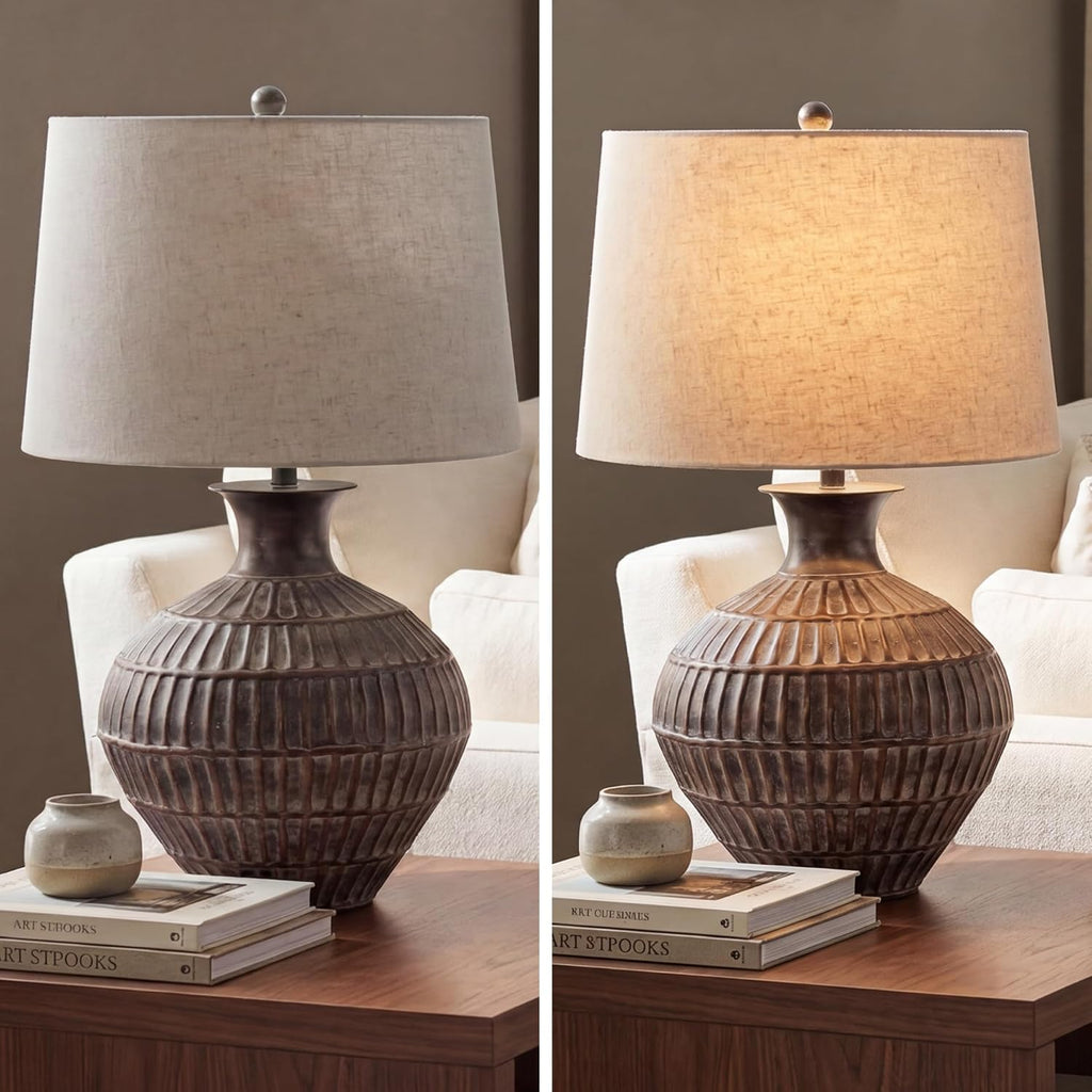 Signature Design by Ashley Magan Metal Table Lamp, 28", Antique Bronze | Antique bronze-tone metal base, Textured pattern, Fabric modified drum shade, Living room or entryway use, 3-way switch