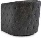 Signature Design by Ashley Swivel Black Faux Leather Accent Chair | Elegant tufted faux leather with brass nailheads, Hidden metal swivel base for effortless conversation, Brentlow Series