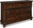 Signature Design by Ashley Porter 7-Drawer Wood Bedroom Dresser, Brown | Traditional chest of drawers, Hidden jewelry tray, Cedar-lined bottoms, Organized bedroom storage