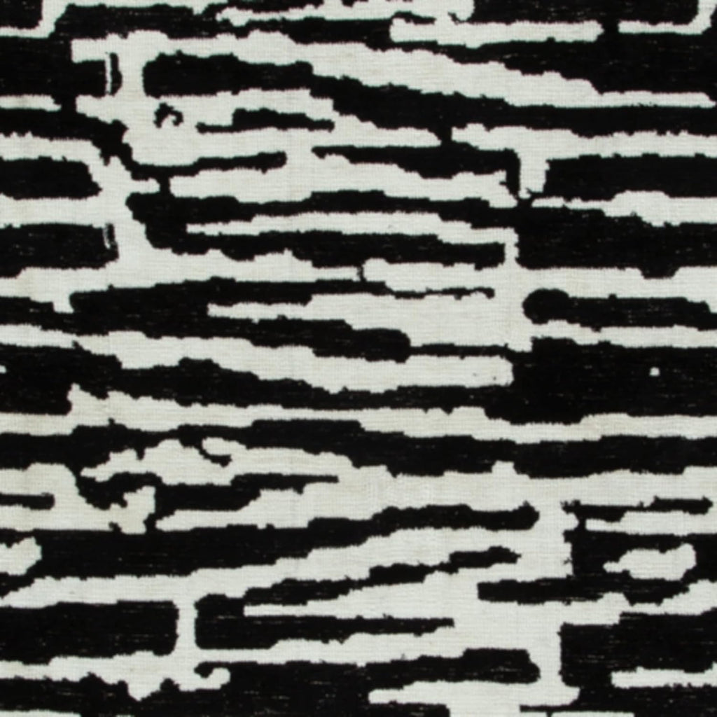 Signature Design by Ashley Bramshaw Area Rug, 5x7, Black and White | Soft 9 mm pile for underfoot comfort, High-contrast abstract pattern, Durable machine-woven polyester