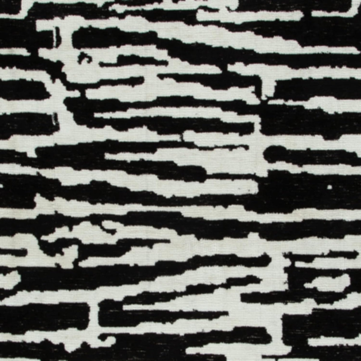 Signature Design by Ashley Bramshaw Area Rug, 5x7, Black and White | Soft 9 mm pile for underfoot comfort, High-contrast abstract pattern, Durable machine-woven polyester