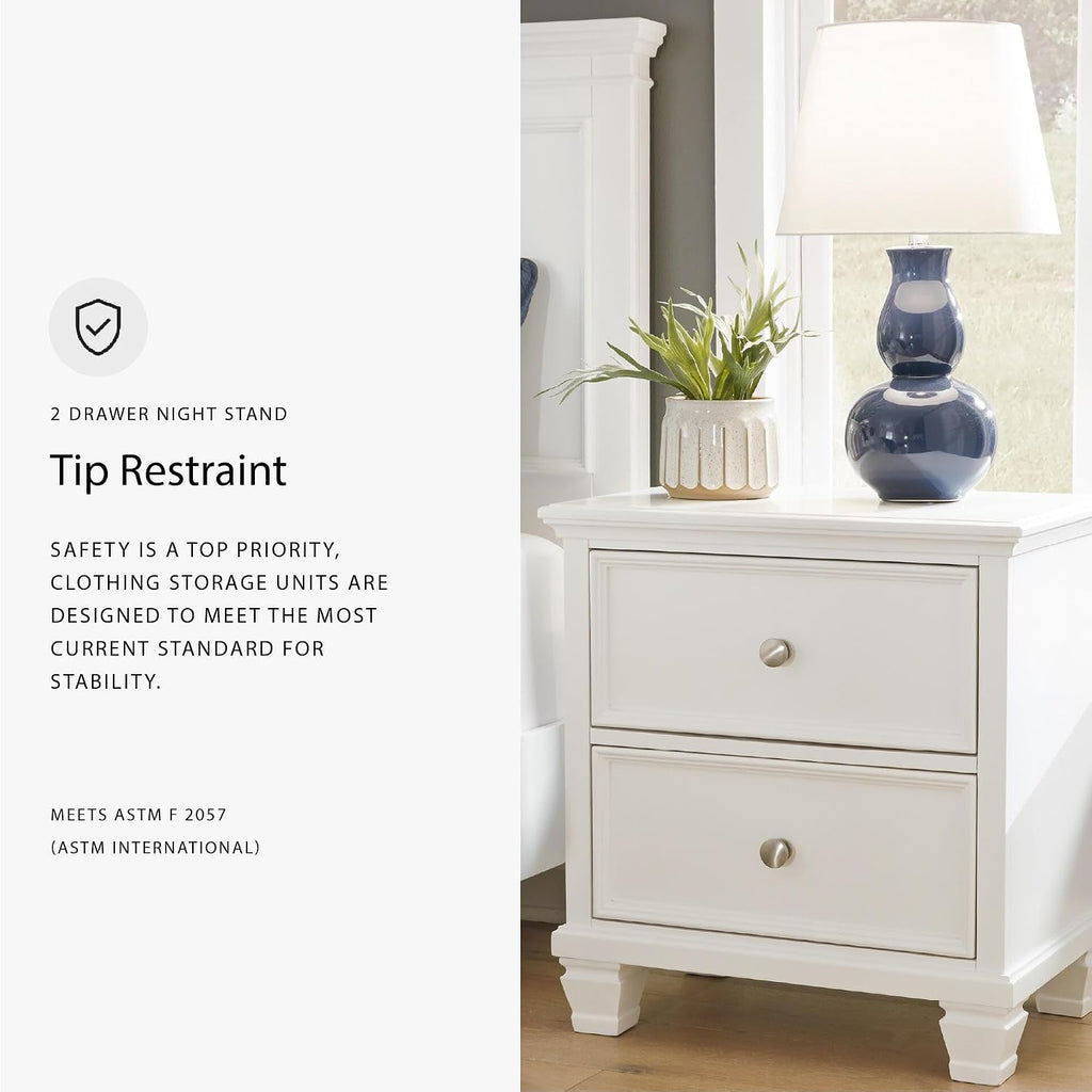 Signature Design by Ashley Fortman White Nightstand, 2 Drawer Storage, Hardwood Solids and MDF Construction, Traditional Wood Bedside Table, 25" W | Hardwood solids and MDF substrate, Smooth-gliding closed storage, Ideal for master and guest rooms
