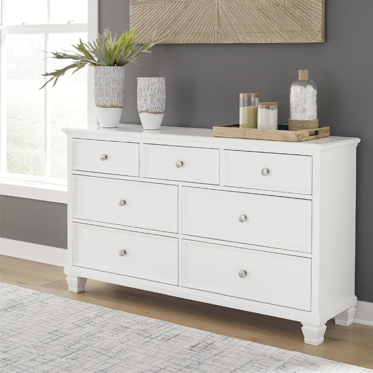 Signature Design by Ashley Fortman White 7-Drawer Wide Dresser for Bedroom | Painted wood chest, Tapered feet, Smooth ball-bearing glides, Durable hardwood solids and MDF substrate construction