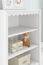 Signature Design by Ashley 3-Tier Scalloped Bookshelf, Matte White Bookcase | Deep 20-inch profile for oversized bins, Durable engineered wood frame with 2 adjustable shelves, Hallityn Series