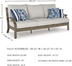 Signature Design by Ashley Rainier Ranch 3-Seat Outdoor Sofa, Beige | Rust-resistant wood-look aluminum frame, UV-resistant Nuvella+ cushions, 3-seat casual contemporary patio sofa