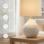 Signature Design by Ashley Ceramic Table Lamp, Bedside, Antique White | Textured wave ceramic base, Compact 18-inch height ideal for bedside nightstands and transitional styling, Wardmont Series