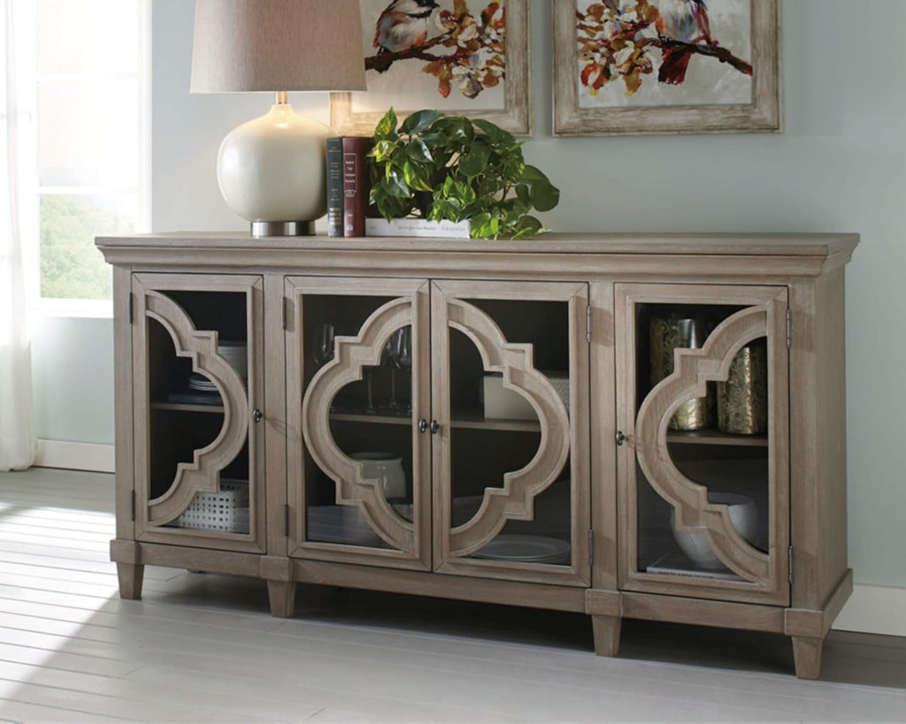 Signature Design by Ashley Fossil Ridge 4-Door Accent Cabinet, Gray | Solid and engineered wood, Tempered glass inlays, Quatrefoil fretwork pattern, 3 adjustable shelves, 76 in width