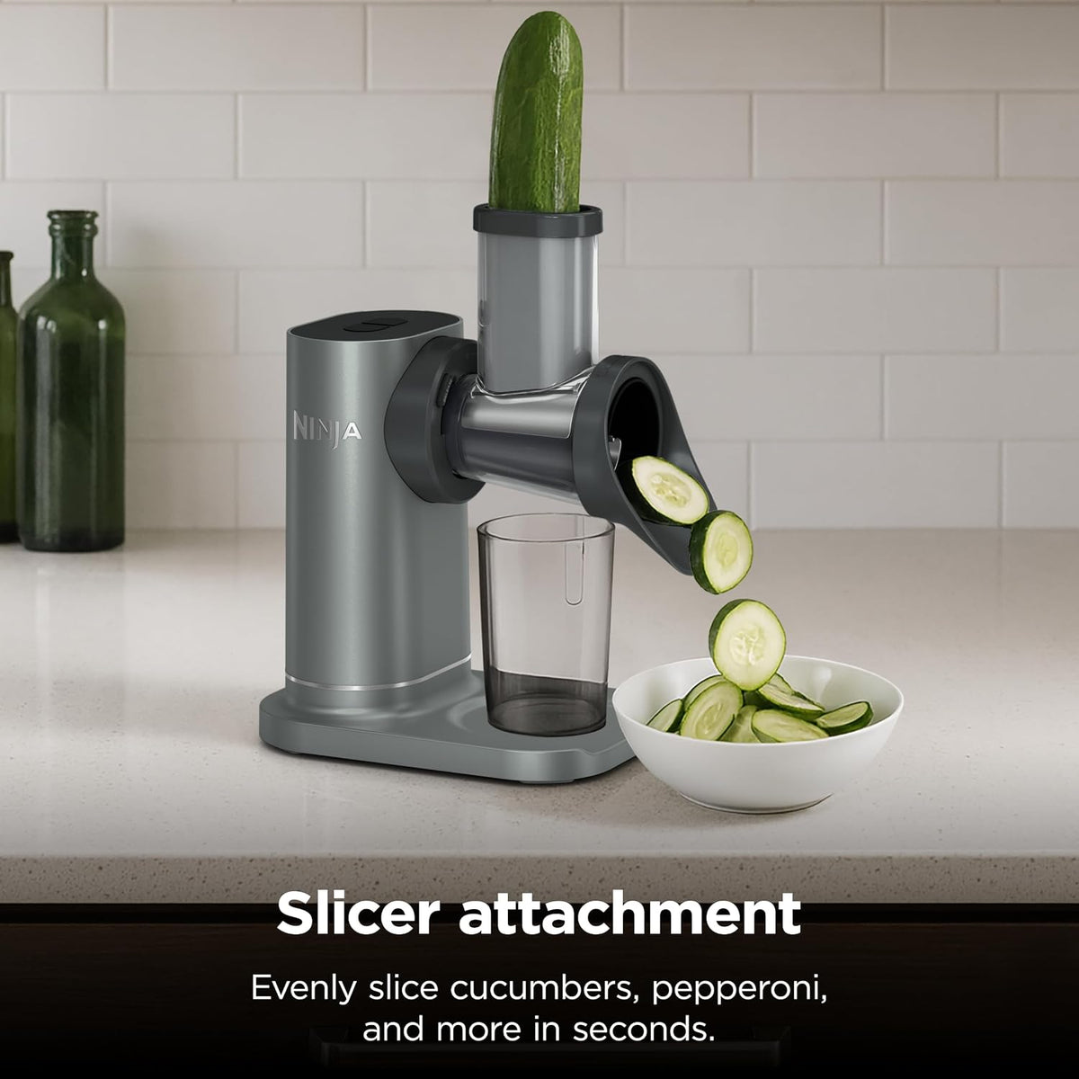 Ninja NeverClog 3-in-1 Juicer, Slicer & Shredder, 32oz Vessel, JC152 | NeverClog auger juices non-stop, plus slicing & shredding attachments. Total Pulp Control, 32-oz vessel, dishwasher safe