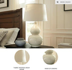 Signature Design by Ashley Saffi 30" Tall Ceramic Table Lamp, Cream | Textured crackle glaze ceramic base, Adjustable 3-way switch for custom ambiance, Light-diffusing fabric drum shade