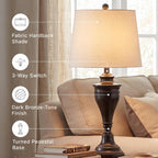 Signature Design by Ashley Table Lamp Set of 2, Dark Bronze | Fabric hardback shade, 28.5 inches tall, Traditional double pillar base, 3-way switch, Living room use, Darlita Series