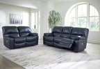 Signature Design by Ashley Leesworth Power Reclining Loveseat, Ocean Blue | Space-saving zero wall design, Top grain leather touchpoints, Built-in zero-draw USB ports, 32 in minimum doorway width