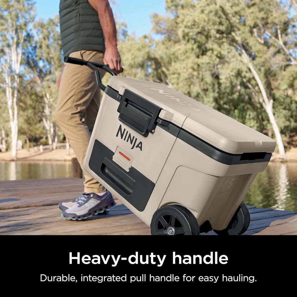 Ninja FrostVault™ 65qt Cooler with Wheels, Dry Storage Drawer, Birch Beige | Ninja FrostVault's 65-qt capacity holds 97 cans, keeps food cool & dry, and rolls easily on all-terrain wheels