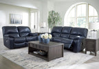 Signature Design by Ashley Leesworth Power Reclining Loveseat, Ocean Blue | Space-saving zero wall design, Top grain leather touchpoints, Built-in zero-draw USB ports, 32 in minimum doorway width