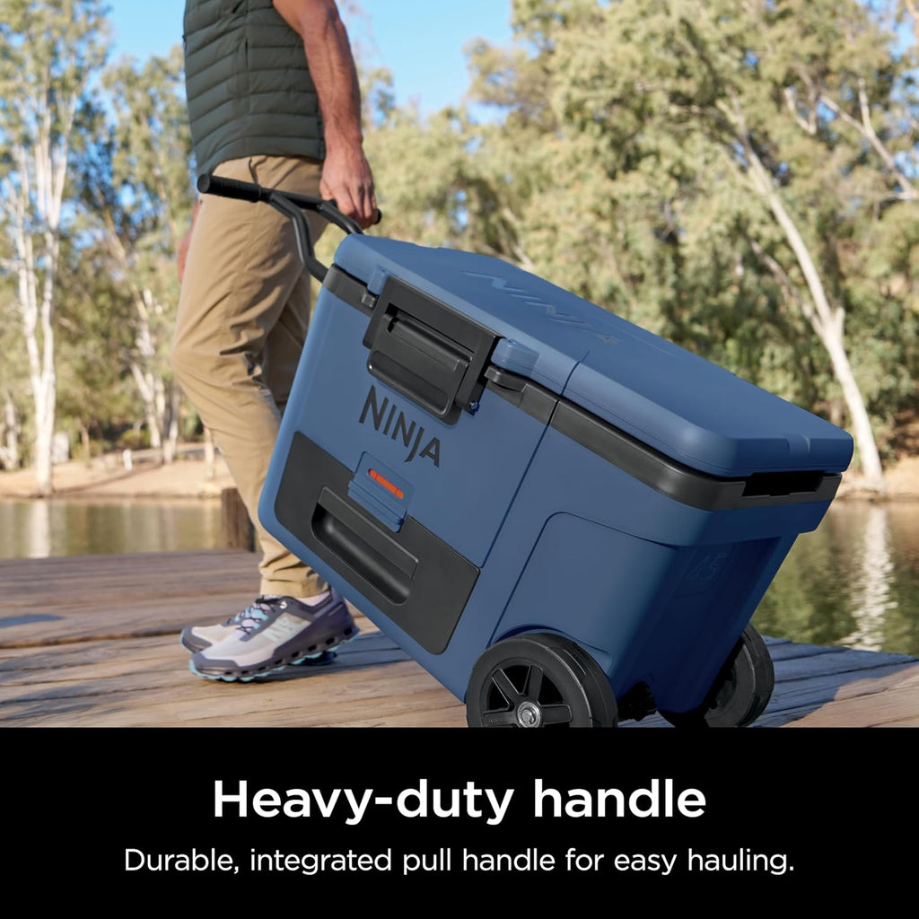 Ninja FrostVault™ 45qt Cooler with Wheels, Dry Storage, Lakeshore Blue | Ninja FrostVault's 45-qt capacity holds 68 cans, keeps food cool & dry, and rolls easily on all-terrain wheels