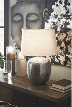 Signature Design by Ashley Magalie Metal Table Lamp, Antiqued Silver | Textured hammered aluminum base, Vintage warmth, Crisp modified drum shade, Cozy living room lighting