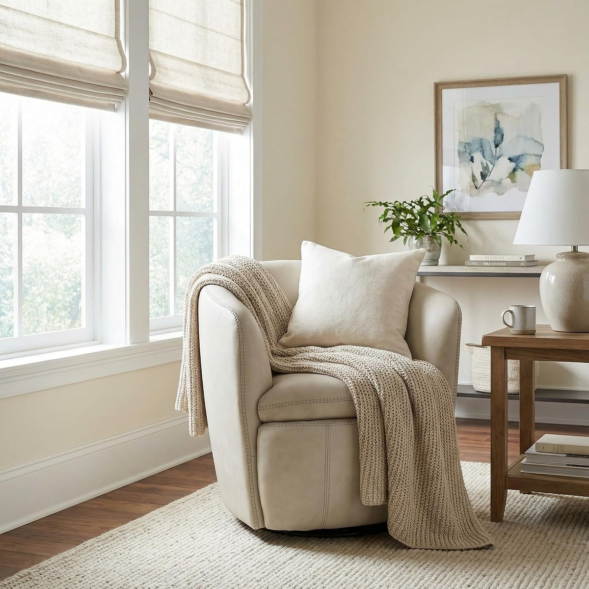 Signature Design by Ashley Kierreys Leather Swivel Barrel Chair, Bone | 100% top grain leather upholstery, 360-degree metal base rotation, Engineered wood and metal frame, Contemporary barrel back