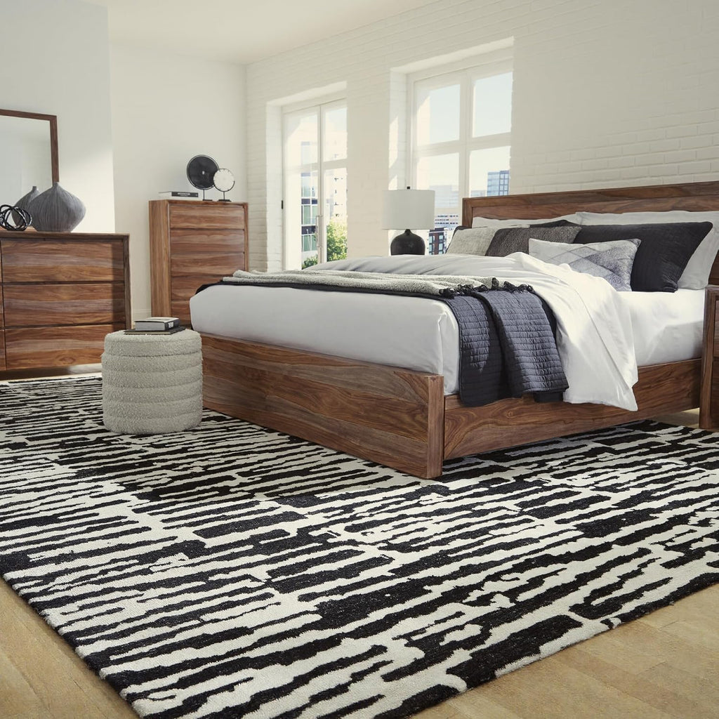 Signature Design by Ashley Area Rug, Abstract 10x14, Black/Ivory | Extra large modern abstract rug with medium 9 mm pile, 100% polyester for spacious living rooms, Bramshaw Series
