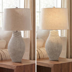 Signature Design by Ashley Layal 29" Table Lamp, Living Room, Beige | Textured paper composite base with 16-inch modified drum shade, 3-way switch for side accents, Stable 10-lb base